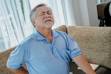 Old asian man suffering from back pain, Health problems medical concept.