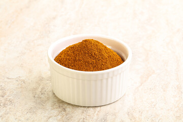 Dry Paprika powder in the bowl