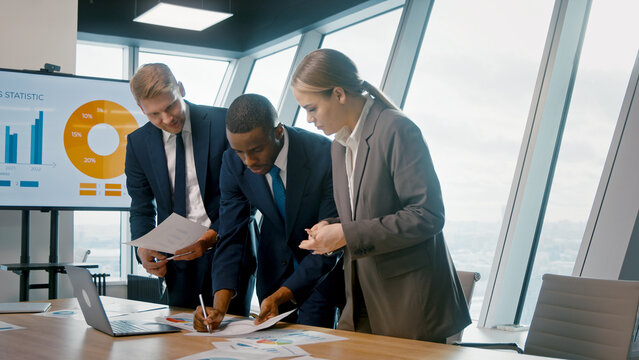 Young colleagues working together planning success strategy - Powered by Adobe