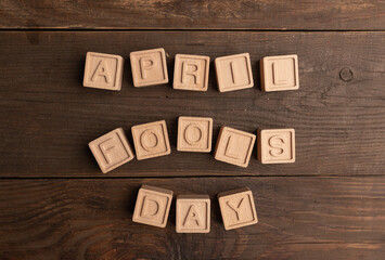 April fools day on wooden cubes. Calendar for April. Fools' Day, calendar date April 1