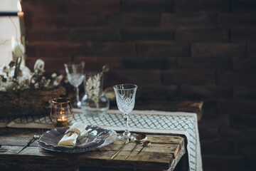 Table setting. A beautifully decorated table in a rustic style. High quality photo