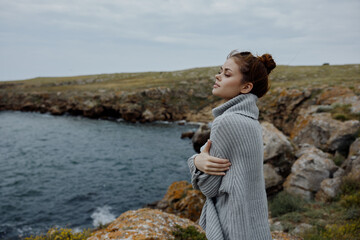 beautiful woman sweaters cloudy sea admiring nature unaltered