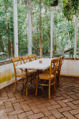 empty wood chair and table in restaurant