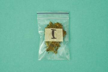 Top view of nylon package with 1 gramm marijuana