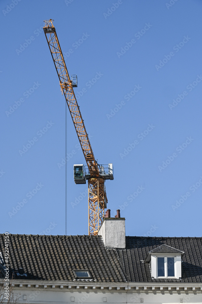 Wall mural Belgique Bruxelles immobilier batiment architecture renovation chantier logement grue Place des Barricades