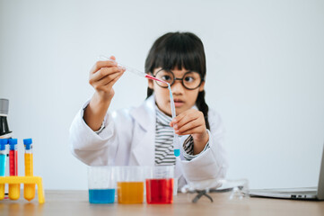 girls doing science experiments in the lab