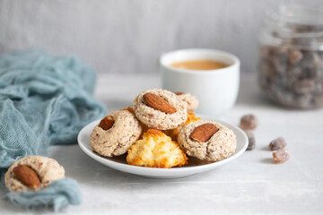 coconut and almond cookies on a small saucer