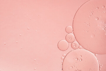Abstract pink oil bubbles background. Cosmetic liquid beauty product. - 492743440