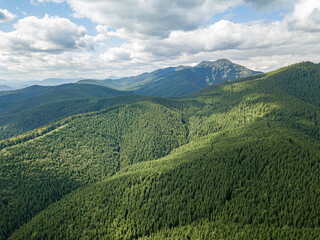 Fototapeta na wymiar High mountains of the Ukrainian Carpathians in sunny weather. Aerial drone view.