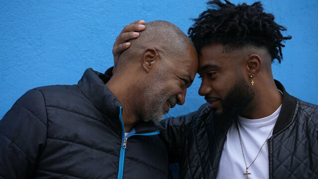 Father and son relationship embrace and hug tender moment together