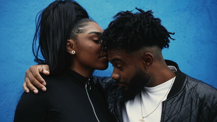 Family love two brother and sisters affection kissing forehead