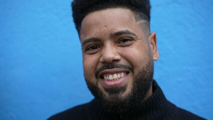 A smiling young black man portrait face