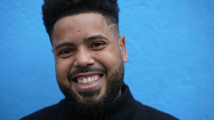 A smiling young black man portrait face