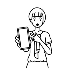 立ってスマートフォンを指差してこちらに向けて見せているオフィスカジュアルの女性