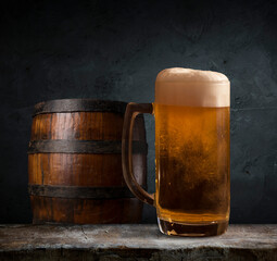 pouring beer with chicken wings in background.