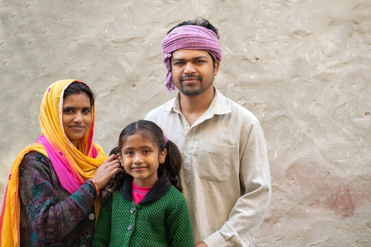 Portrait of Indian rural family smiling