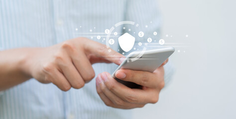 close up businessman hand use smartphone to touchscreen by unlock password on electronic wallet with virtual interface for futuristic technology and finance concept
