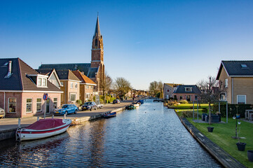 NOORDWIJK BINNEN, NETHERLANDS. FEBRUARY 27, 2022. Beautiful view to the chanel and embankment