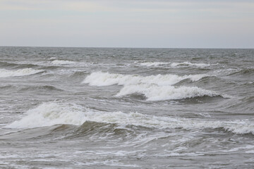 Close pu photography of baltic sea stormy weather waves.