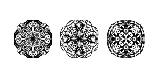 Set of four ethnic round Mandala ornaments isolated on white background. Henna tattoo design.