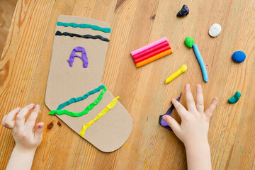 Artwork for World Down Syndrome Day. Children made paper sock as support and compassion symbol.