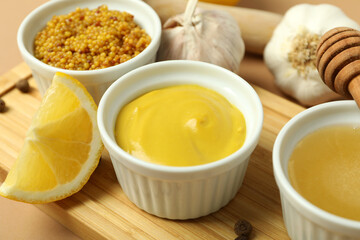 Concept of cooking honey mustard sauce, close up