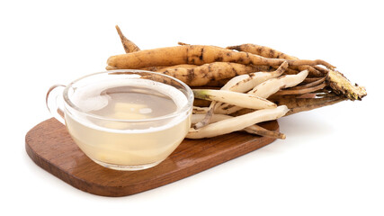 Shatavari or Asparagus racemosus roots and juice isolated on white background.