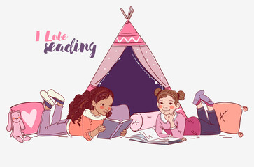 Cute little girls reading books