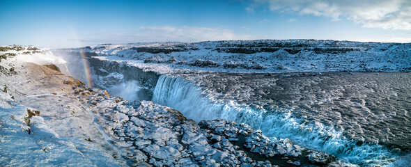 Dettifoss waterfall panorama on winter covered by snow