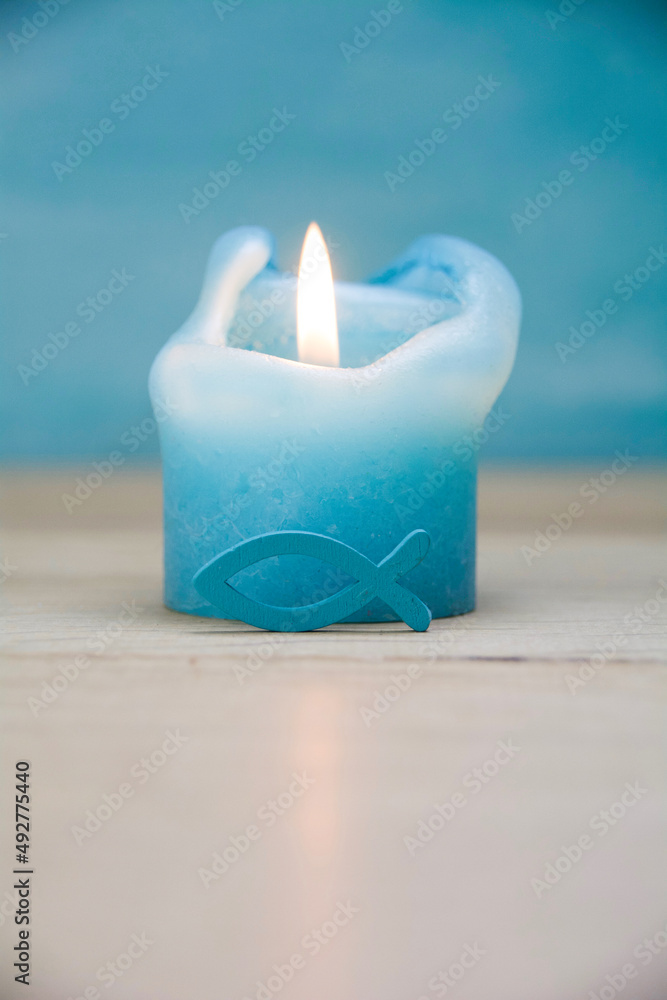 Wall mural candle with fish as a symbol for confirmation, communion, baptism - greeting card or invitation