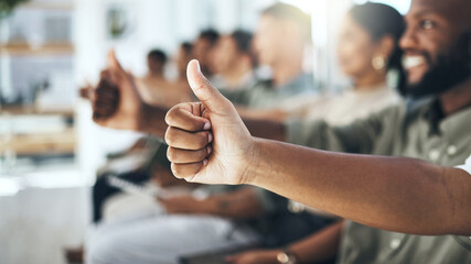 Our answer is yes. Cropped shot of a group of businesspeople giving thumbs up in a modern office.