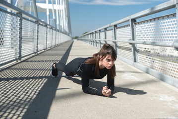 Young active sporty business woman morning routine of stretching and running exercising outdoor before she go to the work at office. Self loved female fitness workout training for healthy life.