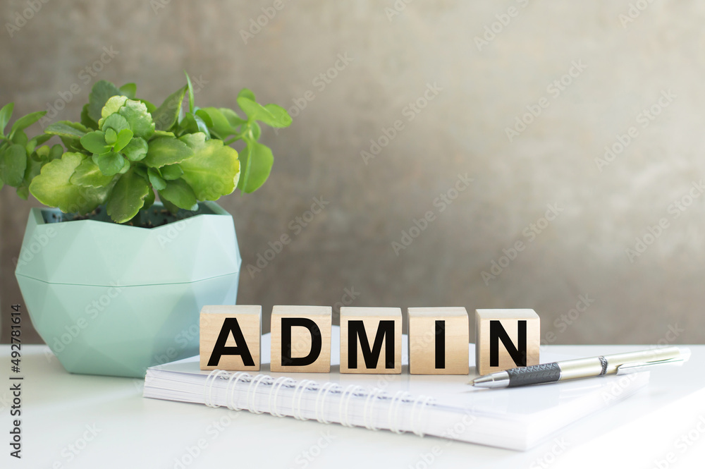 Poster admin word built with letter cubes on a table