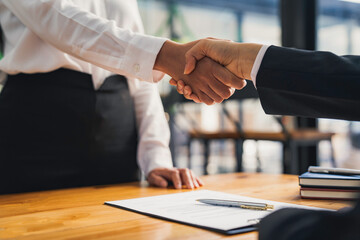 business people Or head of personnel shaking hands congratulating new employees in an interview...