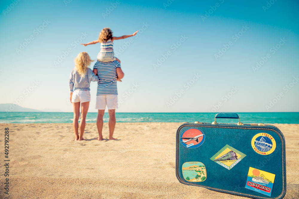 Wall mural happy family having fun on summer vacation