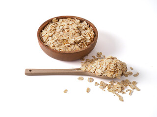 Gluten free wholegrain oat flakes in wooden bowl.