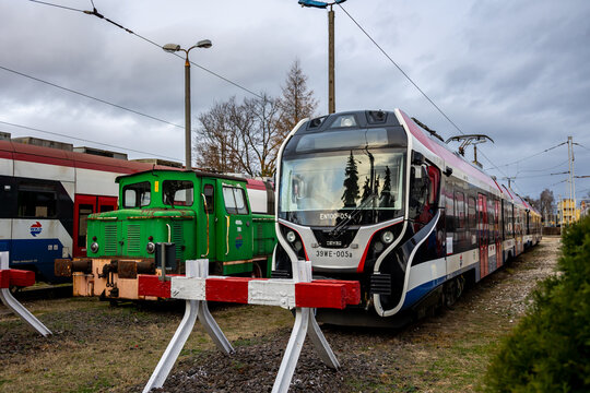 Grodzisk Mazowiecki, Wojew&oacute;dztwo mazowieckie, Poland. 1st of December 2021: Trains at WKD (Warszawskie Koleje DOjazdowe) station in Grodzisk Mazowiecki.