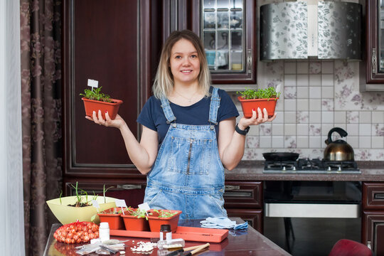 Portrait Of A 30-year-old Girl In A Denim Jumpsuit