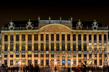  Front view of the historic House of the Dukes of Brabant at night in Grand Place, the central square of Brussels capital city, surrounded by opulent guildhalls