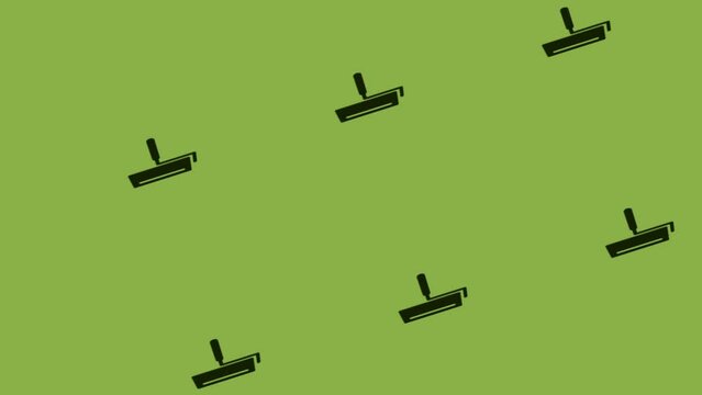 spinning paint roller icon animation on green background
