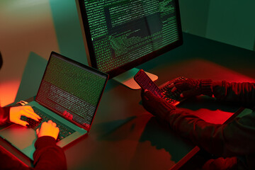 Cyber war. Cyber attack. Anonymous people using computer and programming to break code. Cyber...