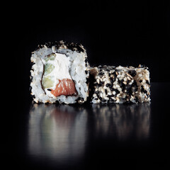Cold cooked rice dressed with vinegar that is shaped into pieces and topped with raw or cooked...