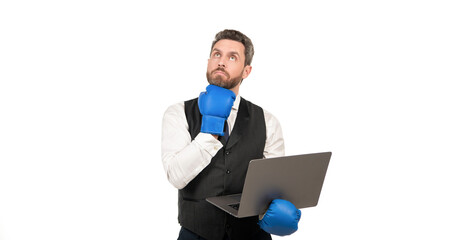 pondering man in boxing gloves and suit hold laptop isolated on white background, ponder