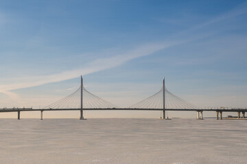 A large bridge in the ice. Cable-stayed bridge.