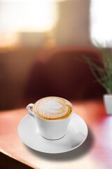 Flat white coffee with milk and coffee powder