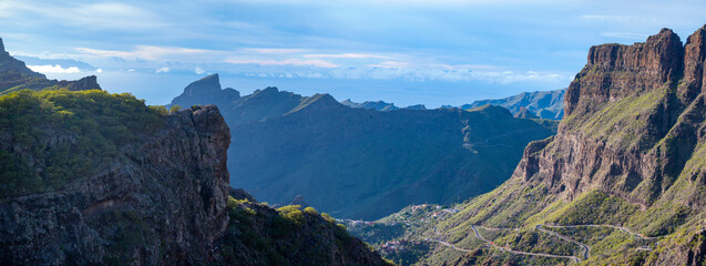 Mountains range in Rural de Teno park near isolated village Masca on Tenerife and La Gomera island on background, Canary islands, Spain