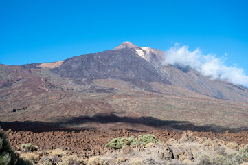 Visiting Teide national park on Tenerife and view on volcanic landscapes, Canary islands, Spain