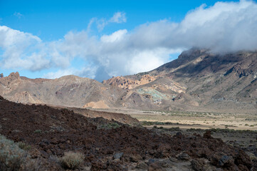 Visiting Teide national park on Tenerife and view on volcanic landscapes, Canary islands, Spain