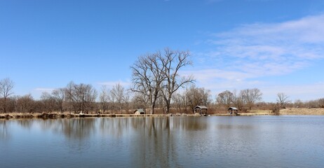 The peaceful scene at the lake on a sunny winter day.