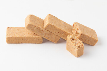 Typical Brazilian sweet paçoca isolated on white background